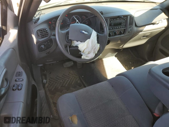 2003 Ford F-150 XL with VIN 2FTRX18L43CA34088, listed as a Copart auction lot 50604455 with 113,761 mi miles and Salvage Title. Bid and sale history available at carsss.com. Image 8.