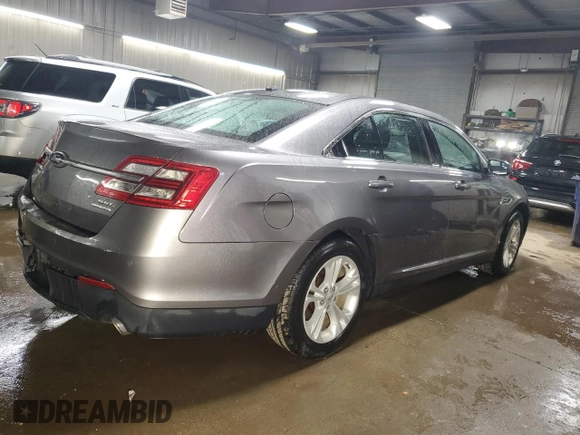 2013 Ford Taurus SEL with VIN 1FAHP2E85DG200884, listed as a Copart auction lot 50330395 with 161,776 mi miles and Salvage Title. Bid and sale history available at DreamBid. Image 3.
