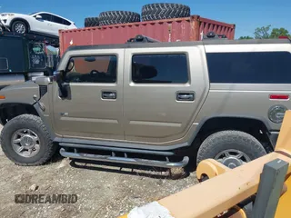 2005 Hummer H2 SUV with VIN 5GRGN23U85H129007, listed as a IAAI auction lot 41625417 with 102,389 mi miles. Bid and sale history available at carsss.com. Image 14.