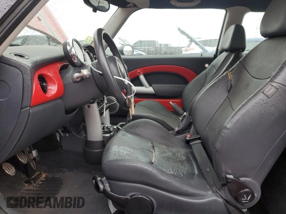 2005 MINI Hardtop S with VIN WMWRE33525TD99548, listed as a Copart auction lot 54778205 with 187,150 mi miles and Salvage title. Bid and sale history available at DreamBid. Image 7.