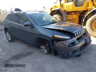 2015 Jeep Cherokee Latitude with VIN 1C4PJMCSXFW725644, listed as a IAAI auction lot 41312764 with 191,714 mi miles and . Bid and sale history available at DreamBid. Image 1.