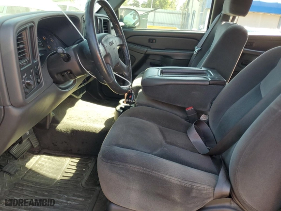 2004 GMC Sierra 1500 Crew Cab SLE with VIN 2GTEC13T241362382, listed as a Copart auction lot 74641124 with 147,379 mi miles and Salvage Title. Bid and sale history available at carsss.com. Image 7.