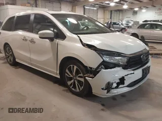 2021 Honda Odyssey Touring with VIN 5FNRL6H80MB026908, listed as a IAAI auction lot 41564765 with 116,453 mi miles. Bid and sale history available at carsss.com. Image 1.