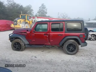 2021 Jeep Wrangler Unlimited Willys with VIN 1C4HJXDN6MW815448, listed as a IAAI auction lot 41459304 with 52,474 mi miles and . Bid and sale history available at DreamBid. Image 14.