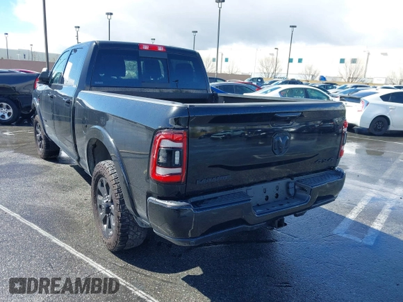2022 Ram 2500 Laramie z VIN 3C6UR5FL2NG377414, wystawiony jako IAAI lot #41492443 z przebiegiem 100 477 mil mil oraz . Historia ofert i sprzedaży dostępna na DreamBid. Obrazek 3.