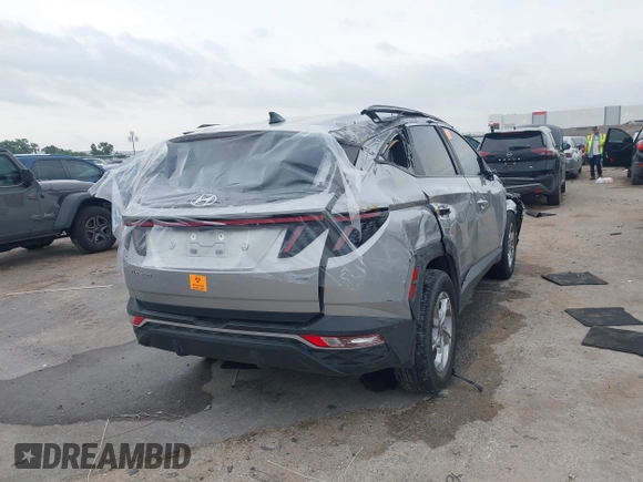 2023 Hyundai Tucson SEL with VIN 5NMJBCAE9PH173732, listed as a IAAI auction lot 42408802 with 37,378 mi miles and . Bid and sale history available at DreamBid. Image 4.