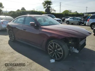 2022 BMW i4 eDrive40 with VIN WBY73AW05NFN05084, listed as a Copart auction lot 50677374 with 30,609 mi miles. Bid and sale history available at carsss.com. Image 4.