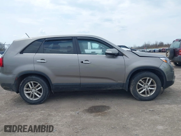 2015 Kia Sorento LX with VIN 5XYKTCA66FG570155, listed as a IAAI auction lot 42123965 with 110,748 mi miles and . Bid and sale history available at carsss.com. Image 13.