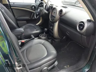 2012 MINI Countryman with VIN WMWZB3C54CWM01897, listed as a IAAI auction lot 42083668 with 132,417 mi miles and . Bid and sale history available at DreamBid. Image 5.