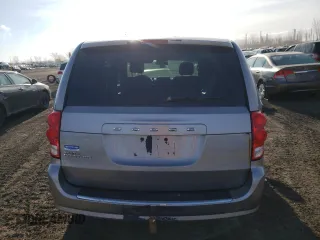2014 Dodge Grand Caravan American Value with VIN 2C4RDGBG5ER185593, listed as a Copart auction lot 48768065 with 167,834 mi miles and Salvage Title. Bid and sale history available at DreamBid. Image 6.