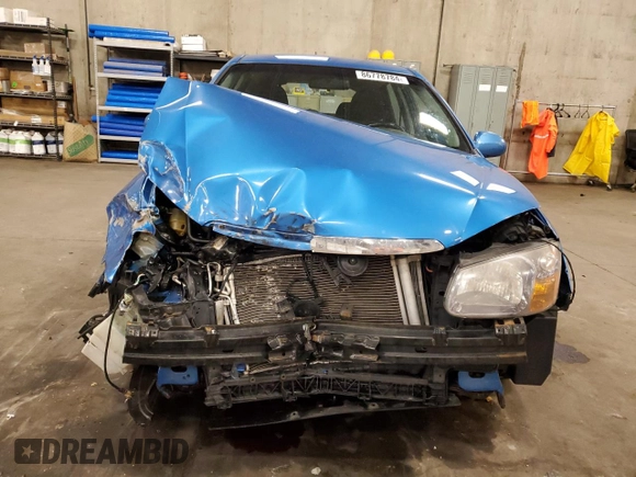 2007 Kia Spectra with VIN KNAFE161775007569, listed as a Copart auction lot 86778784 with 125,463 mi miles and Salvage Title. Bid and sale history available at carsss.com. Image 5.