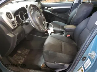 2009 Pontiac Vibe with VIN 5Y2SM67049Z437840, listed as a Copart auction lot 87366354 with 174,875 mi miles and Salvage Title. Bid and sale history available at carsss.com. Image 7.