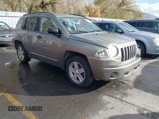 2007 Jeep Compass Sport with VIN 1J8FF47W37D325148, listed as a IAAI auction lot 40962150 with 198,345 mi miles. Bid and sale history available at carsss.com. Image 1.