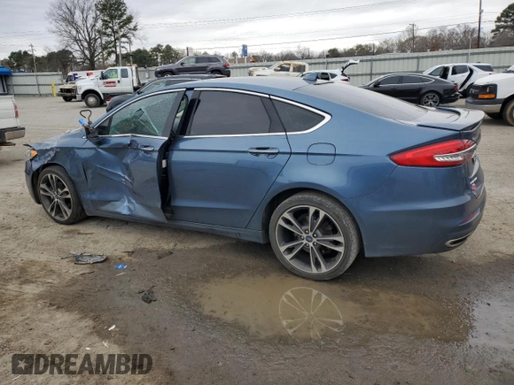 2019 Ford Fusion Titanium with VIN 3FA6P0D99KR117213, listed as a Copart auction lot 46450585 with 128,868 mi miles and Salvage Title. Bid and sale history available at carsss.com. Image 2.