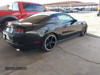 2011 Ford Mustang GT with VIN 1ZVBP8CF0B5107488, listed as a IAAI auction lot 42078619 with 148,171 mi miles. Bid and sale history available at carsss.com. Image 4.