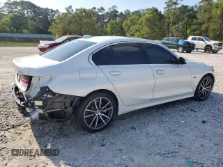 2022 BMW 3 Series 330e with VIN 3MW5P7J03N8C66082, listed as a Copart auction lot 50627595 with 70,799 mi miles and Salvage Title. Bid and sale history available at carsss.com. Image 3.