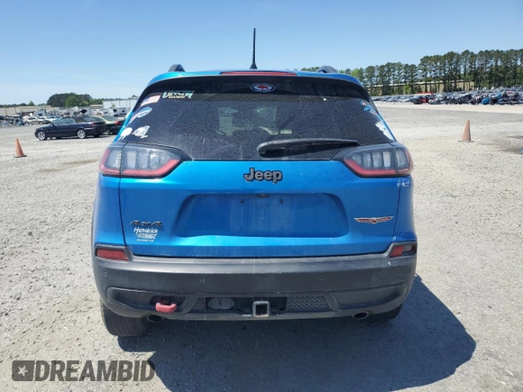 2019 Jeep Cherokee Trailhawk Elite z VIN 1C4PJMBXXKD309306, wystawiony jako Copart lot #53428305 z przebiegiem 99 448 mil mil oraz Szkoda całkowita • Salvage title. Historia ofert i sprzedaży dostępna na DreamBid. Obrazek 6.
