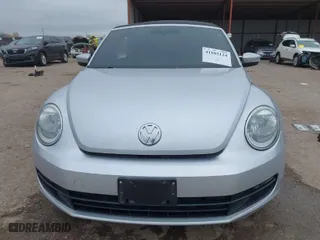 2013 Volkswagen Beetle Convertible 2.5L with VIN 3VW5X7AT0DM821473, listed as a IAAI auction lot 41103124 with 112,953 mi miles. Bid and sale history available at carsss.com. Image 12.