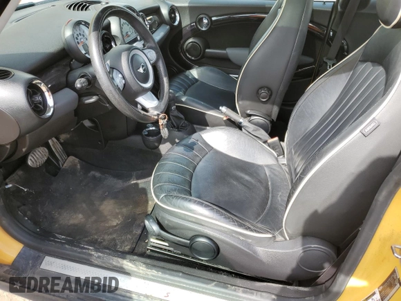 2009 MINI Hardtop S with VIN WMWMF73539TW85832, listed as a Copart auction lot 57343575 with 172,564 mi miles and Clean title. Bid and sale history available at DreamBid. Image 7.