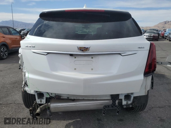 2021 Cadillac XT5 FWD Premium Luxury with VIN 1GYKNCRS0MZ110560, listed as a Copart auction lot 52779575 with 44,559 mi miles and Salvage title. Bid and sale history available at DreamBid. Image 6.