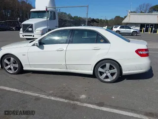 2012 Mercedes-Benz E-Class E 350 Luxury with VIN WDDHF8JB2CA619686, listed as a IAAI auction lot 42079521 with 129,025 mi miles. Bid and sale history available at carsss.com. Image 14.