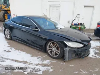 2013 Tesla Model S with VIN 5YJSA1AG2DFP11228, listed as a IAAI auction lot 41339370 with 121,237 mi miles and . Bid and sale history available at DreamBid. Image 1.