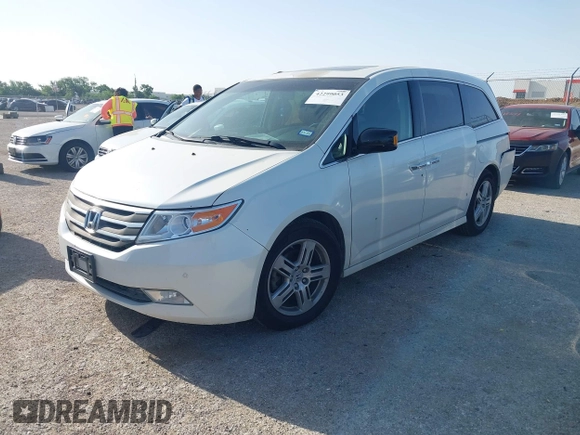 2012 Honda Odyssey Touring with VIN 5FNRL5H93CB125241, listed as a IAAI auction lot 42299053 with 125,549 mi miles and . Bid and sale history available at DreamBid. Image 17.
