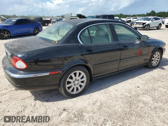 2003 Jaguar X-Type 2.5L Manual z VIN SAJEA51D73XD21289, wystawiony jako Copart lot #59583194 z przebiegiem 70 333 mil mil oraz Czysty tytuł • Clean title. Historia ofert i sprzedaży dostępna na DreamBid. Obrazek 3.