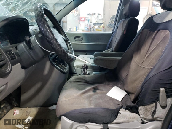 2005 Kia Sedona LX with VIN KNDUP131556615011, listed as a Copart auction lot 47174335 with 161,458 mi miles and Salvage Title. Bid and sale history available at carsss.com. Image 7.