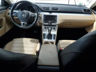2014 Volkswagen CC R-Line with VIN WVWBP7AN4EE525757, listed as a Copart auction lot 55293795 with 124,890 mi miles and Salvage title. Bid and sale history available at DreamBid. Image 8.
