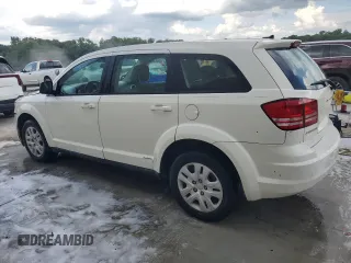 2014 Dodge Journey American Value with VIN 3C4PDCAB3ET216889, listed as a Copart auction lot 60874265 with 117,508 mi miles and Salvage title. Bid and sale history available at DreamBid. Image 2.