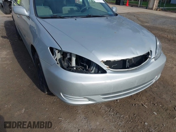 2004 Toyota Camry LE with VIN 4T1BE32K64U282875, listed as a IAAI auction lot 42038006 with 238,605 mi miles. Bid and sale history available at carsss.com. Image 6.