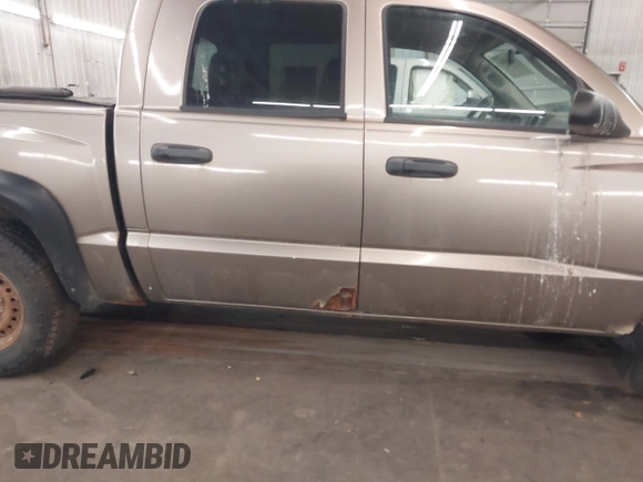2006 Dodge Dakota SLT with VIN 1D7HE48K36S635377, listed as a IAAI auction lot 42200803 with 156,812 mi miles and . Bid and sale history available at carsss.com. Image 13.
