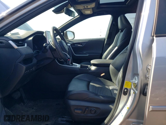 2021 Toyota RAV4 Hybrid XSE with VIN 2T3E6RFV9MW013200, listed as a Copart auction lot 52163255 with 58,336 mi miles and Salvage title. Bid and sale history available at DreamBid. Image 7.