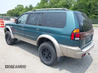 2004 Mitsubishi Montero XLS z VIN JA4MT31R34J007557, wystawiony jako IAAI lot #42368032 z przebiegiem 172 104 mil mil oraz . Historia ofert i sprzedaży dostępna na DreamBid. Obrazek 3.