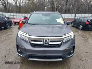 2021 Honda Pilot Touring 8-Passenger with VIN 5FNYF5H9XMB014190, listed as a IAAI auction lot 41749586 with 67,602 mi miles and . Bid and sale history available at DreamBid. Image 13.