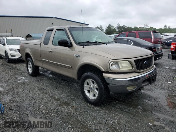 2002 Ford F-150 XL with VIN 1FTRX18L02NA58574, listed as a Copart auction lot 57156255 with 291,950 mi miles and Salvage title. Bid and sale history available at DreamBid. Image 4.