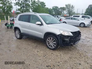 2011 Volkswagen Tiguan SE with VIN WVGBV7AX7BW503311, listed as a IAAI auction lot 42427598 with 99,812 mi miles and . Bid and sale history available at DreamBid. Image 1.