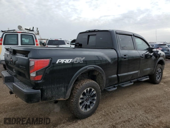 2020 Nissan Titan XD Platinum Reserve with VIN 1N6AA1FB8LN510908, listed as a Copart auction lot 49308085 with 60,154 mi miles and Salvage Title. Bid and sale history available at carsss.com. Image 3.