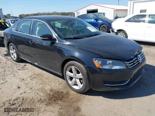 2013 Volkswagen Passat SE w/Sunroof with VIN 1VWBH7A36DC020984, listed as a IAAI auction lot 41883902 with 169,916 mi miles. Bid and sale history available at carsss.com. Image 1.