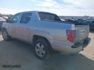 2014 Honda Ridgeline RTL with VIN 5FPYK1F5XEB008421, listed as a IAAI auction lot 41266050 with 86,490 mi miles. Bid and sale history available at carsss.com. Image 3.