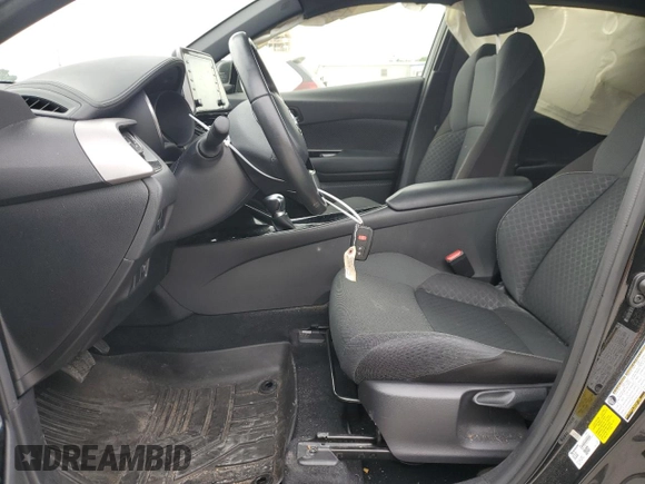 2021 Toyota C-HR LE with VIN JTNKHMBX7M1128976, listed as a Copart auction lot 54297035 with Not Provided miles and Salvage Title. Bid and sale history available at DreamBid. Image 7.
