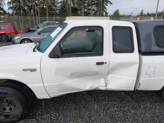 1994 Ford Ranger XL with VIN 1FTCR14A2RPC50050, listed as a IAAI auction lot 41857128 with 237,654 mi miles. Bid and sale history available at carsss.com. Image 6.