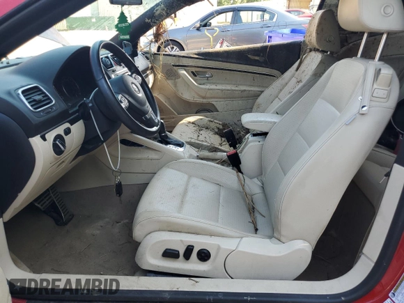 2014 Volkswagen Eos Sport z VIN WVWBW8AH9EV002933, wystawiony jako Copart lot #56212705 z przebiegiem 142 117 mil mil oraz Szkoda całkowita • Salvage title. Historia ofert i sprzedaży dostępna na DreamBid. Obrazek 7.