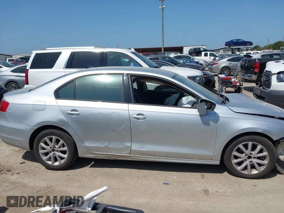 2012 Volkswagen Jetta SE with VIN 3VWBP7AJXCM340937, listed as a IAAI auction lot 42526373 with 157,113 mi miles and . Bid and sale history available at DreamBid. Image 12.