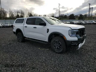 2024 Ford Ranger XLT with VIN 1FTER4HH5RLE15159, listed as a Copart auction lot 46310435 with 1,858 mi miles and Salvage Title. Bid and sale history available at carsss.com. Image 4.