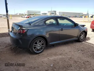 2010 Scion tC with VIN JTKDE3B70A0312506, listed as a Copart auction lot 48233795 with 134,695 mi miles and Salvage Title. Bid and sale history available at carsss.com. Image 3.