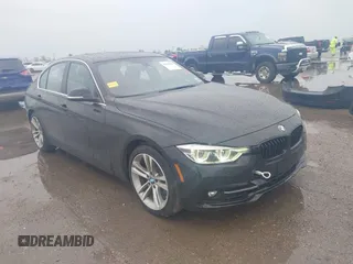 2017 BMW 3 Series 330i with VIN WBA8B9C58HK675679, listed as a IAAI auction lot 41878310 with 87,310 mi miles. Bid and sale history available at carsss.com. Image 1.