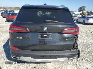 2023 BMW X5 sDrive40i with VIN 5UXCR4C06P9P01409, listed as a Copart auction lot 43127395 with 27,564 mi miles and Salvage Title. Bid and sale history available at carsss.com. Image 6.
