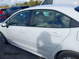2023 Toyota Corolla Hybrid LE with VIN JTDBCMFEXP3017214, listed as a IAAI auction lot 40590468 with 9,428 mi miles and . Bid and sale history available at carsss.com. Image 15.